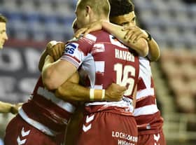 The Warriors celebrate Bevan French's first half try