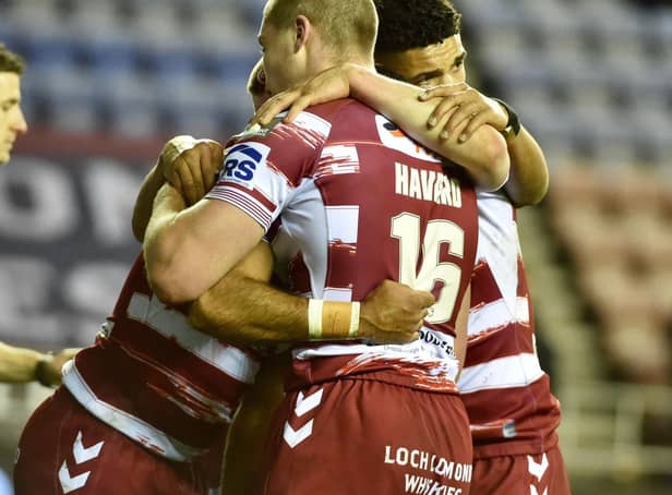 The Warriors celebrate Bevan French's first half try