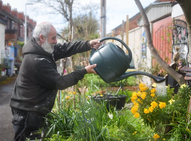 A group of residents have created a community garden in their alleyway called Strawberry Gardens. Pictured is Paul Ogden.