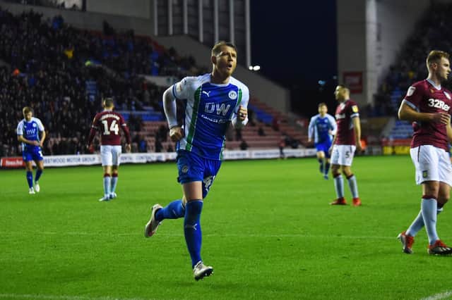 Joe Garner scoring against Aston Villa during his Latics days