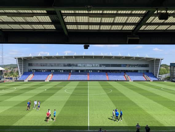 Wigan take on Oldham at Boundary Park