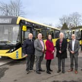 Representatives from Alexander Dennis, Rotala, TfGM's bus team and Transport Commissioner Vernon Everitt with the 67 new low-emission buses at Diamond's depot in Eccles, Salford