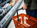 Supermarkets and some shops will be closed in Wigan on Monday as the country pays its respects to Her Majesty the Queen