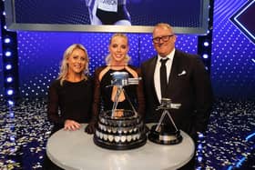 Keely Hodgkinson celebrates a unique hat-trick at the Sports Personality of the Year awards with her coaches Trevor Painter and Jenny Meadows