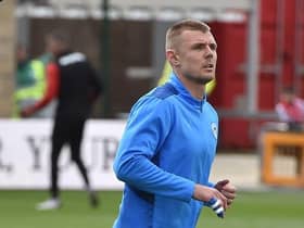Max Power warms up for Saturday's game at Lincoln
