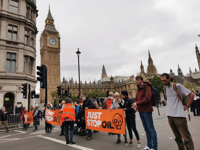 Just Stop Oil of protesters occupying roads around Westminster in central London