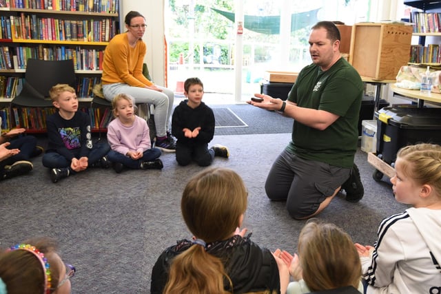 Danny Jubb from Curious Critters brings a selection of cute animals and creepy crawlies, to show children at Standish Library, part of Easter holiday activities.