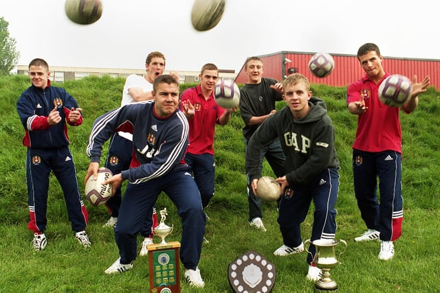 The St. John Fisher RC High School rugby league team gained an entry in the Guinness Book of Records in 2000.  They remained unbeaten in the English Schools National League for 5 consecutive years from 1995 to 1999.  Pictured are some of the former players who returned to the Beech Hill school to receive their certificates Billy-Jo Edwards, Sean O'Loughlin, Damien Simms, Andrew Crabtree, Lee Ford, Steven Bennet and Gary Winstanley.