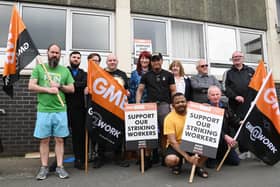 G4S security staff and supporters on a picket line outside Wigan's job centre at Brocol House