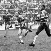 Wigan winger Martin Offiah streaks away with Shaun Edwards in support to score one of his five tries against Warrington in the Premiership Trophy 1st round match at Central Park on Sunday 25th of April 1993.
Wigan won 40-5.