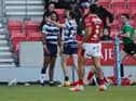 Bevan French celebrates with Jai Field after scoring his first try
