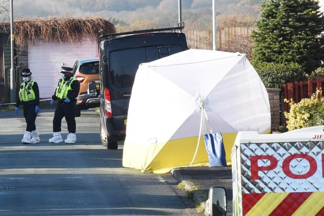 Police at the scene where Liam Smith's body was found in Kilburn Drive, Shevington