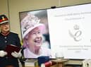 Greater Manchester Lord Lieutenant Diane Hawkins, representing his majesty the King, presents the award.