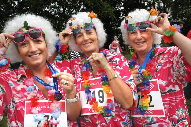 Left to right, Dawn Roberts, Lynne Marsh and Glenis Evans with their medals at the end of the Race For Life on Sunday 24th of June 2007.