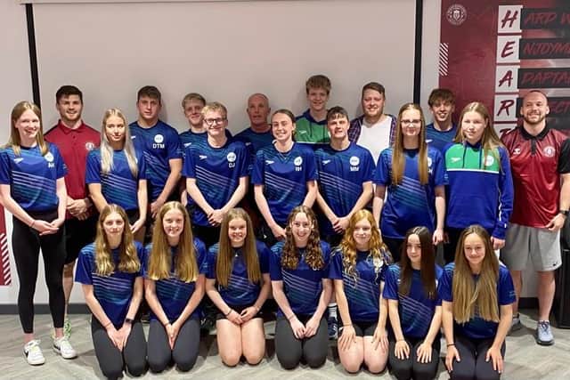 John Bateman and Liam Marshall presented Wigan Best Swim with their kits