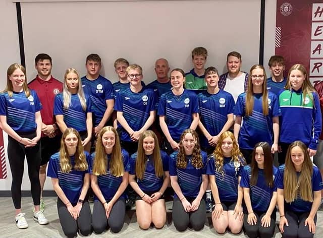 John Bateman and Liam Marshall presented Wigan Best Swim with their kits