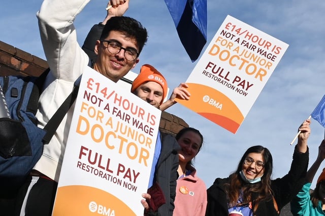 Flags and placards were waved by junior doctors on the picket line outside Wigan Infirmary