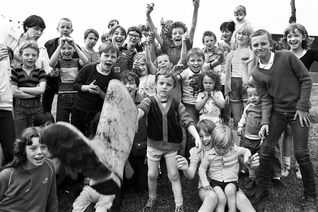 Giving it some wellie in Whelley. Youngsters at a fun day at Whelley Labour Club get the boot in with some wellie throwing on Spring Bank Holiday Monday 31st of May 1982.