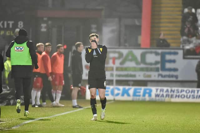Jensen Weir can't believe he's been sent off at Stevenage