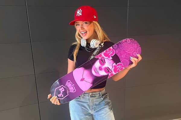 Dancer Robyn Brown with a Royal Family dance crew skateboard, as she prepares to head to New Zealand to join them