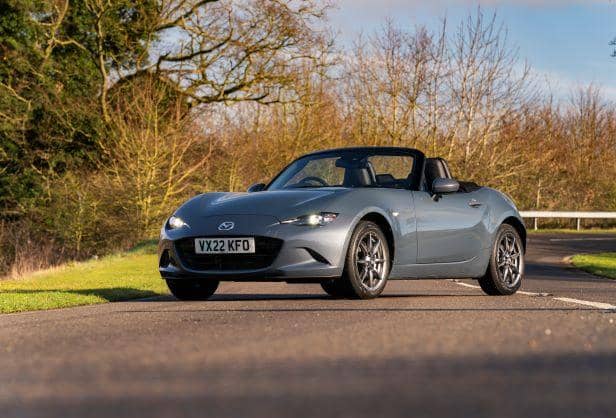 The Mazda MX-5 looks stunning with the roof down.