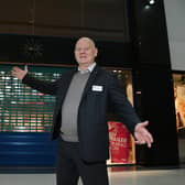 Mike Matthews, general manager of The Grand Arcade shopping centre, Wigan, next to the empty until that will become a Trespass outlet next month