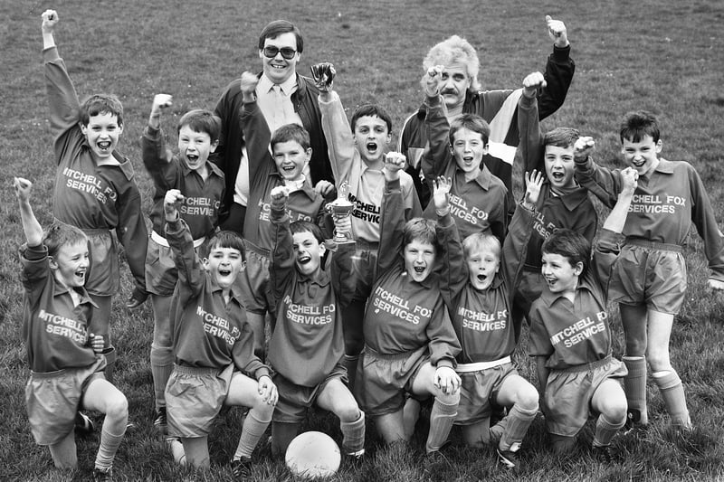 The 19th Wigan Boys Brigade, Vale Methodists, Appley Bridge, who won the Wigan Section Football Cup Final beating the 12th Wigan, St. John's, Hindley Green, 11-2 at Ince on Wednesday 12th of April 1989.
At the back are Gary Fox, left, Director of Mitchell Fox Services, who provided the team strip and team manager Bill Farrell.