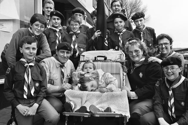 Joining the 28th Wigan St. Maries, Standish, Scouts and Cubs are babies Claire and Rebecca at the annual St. George's Day parade on Sunday 23rd of April 1989.
