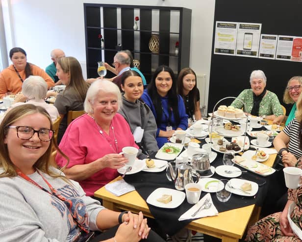 Members of Age UK Wigan Borough and Wigan and Leigh College students enjoyed afternoon tea