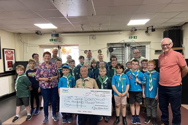 Members of the Scout group with their Brighter Borough cheque