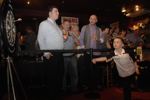 Darts Ace's Terry Jenkins and Adrian Lewis opened the new Darts zone at Rileys, Powell Street, Wigan.
They took part in a tournament against locals and five year  old wonderkid Nathan Butcher