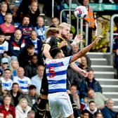 Jack Whatmough in action at QPR before injury struck