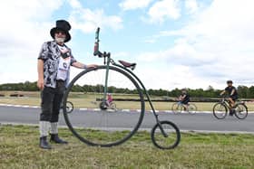 Keith Openshaw enjoys a cycle around the track on his penny-farthing.