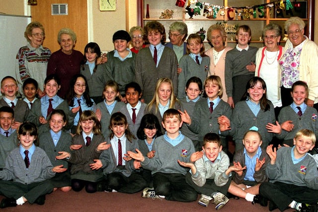 Children from Low Hall School entertained residents at Langton Court in Platt Bridge with a festive Carol Service and Christmas sing-a-long in 1997