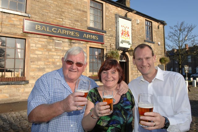 Chris and Vicky Mayers, new landlord and landlady of The Balcarres Arms, Haigh, and Vicky's dad and the pub's former landlord himself, Malcolm Horrocks