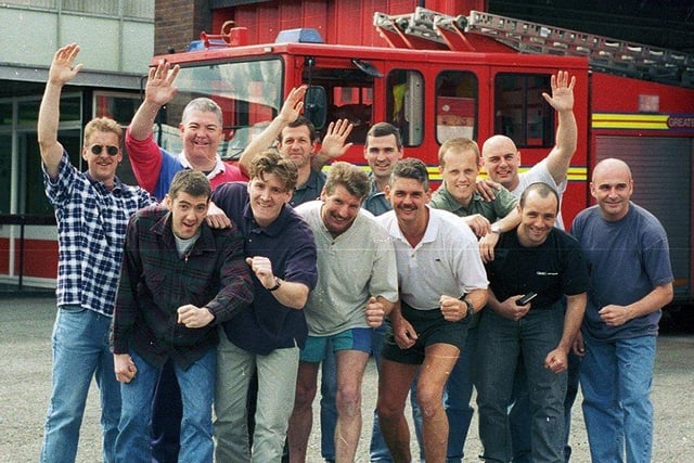 RETRO 1996
Wigan fire fighters of red watch prepare for the three peaks challenge for charity .