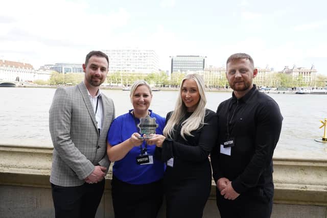 Left to right: Chris Rimmer (general manager, Howe Bridge LC), Gaynor Eastham (lead officer - public health, Wigan Council), Shannon Fairhurst (HAF Coordinator, Wigan Council) and Tony Doyle (WN7 Outreach) with the National Recognition Award.