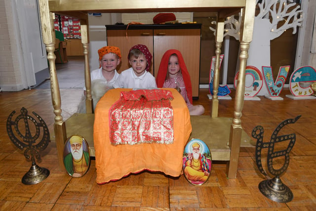 Prags Birk, creative director of Cultural Education-Asians, with pupils at Aspull Church Primary School, to deliver Hinduism and Sikhism interative workshops, with traditional dancing, dressing up, henna, artwork and a Sikh Gurudwara set up, to every year group in the school.