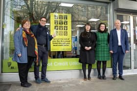 Andy Burnham outisde Hoot Credit Union with Chris Canham, Rebecca Frost and Josie Shohet of SoundPound Group, and Transport Commissioner Vernon Everitt