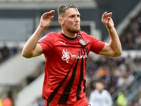 Charlie Wyke has been earmarked as Latics' man to stop this weekend by Cambridge head coach Mark Bonner