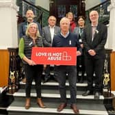 White Ribbon Day. Wigan councillors show their support to end violence towards women and reaffirm the council's commitment to the Love Is Not Abuse initiative.