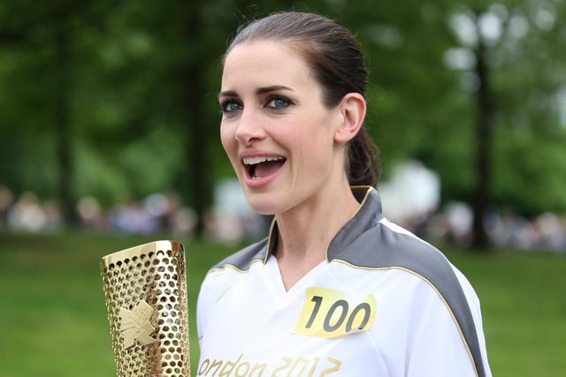 Torchbearer 100 Kirsty Gallacher after carrying the Olympic Flame on the Torch Relay leg between Wigan and Ince-in-Makerfield. 