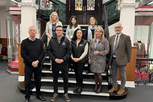At Wigan Town Hall: Bottom row (l-r) Coun David Molyneux MBE, Leader of Wigan Council, Jon Hutchinson – Groundwork CLM, Iona Fazer – Safer Sphere, Alison Mckenzie-Folan, chief executive Wigan Council, Coun Paul Prescott, cabinet member(top row l-r) Cabinet members Couns Susan Gambles, Nazia Rehman and Jenny Bullen