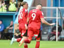 Charlie Wyke's third goal of the season gave Latics the lead at Carlisle