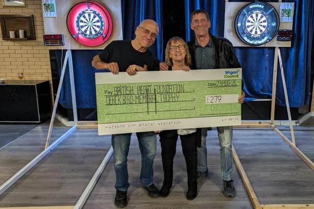 Ken, Susan and Philip with the cheque
