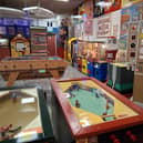 A selection of machines within the NOVELTY-ORIUM including the giant fortune telling robot - Illusion-O!