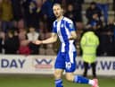 Will Keane celebrates scoring his penalty against Sutton