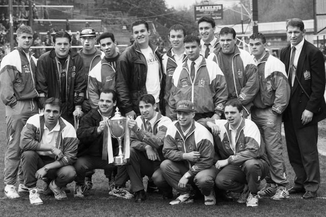 The Wigan Rugby League Club alliance team and coach Graeme West in April 1993 with the championship trophy after winning the double for the second year running.