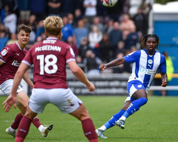 Baba Adeeko in action for Latics at Northampton on the last day of the season