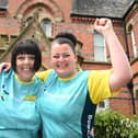 Wigan Infirmary staff Debbie Paterson, who walked 100 miles during Bowel Cancer Awareness Month, and Carley Mercer, who ran 60 miles